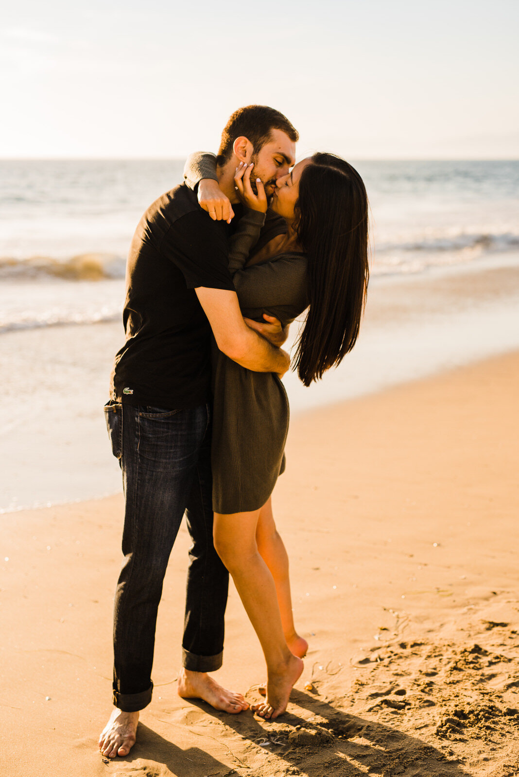 Couple shares romantic embrace at Hermosa Beach