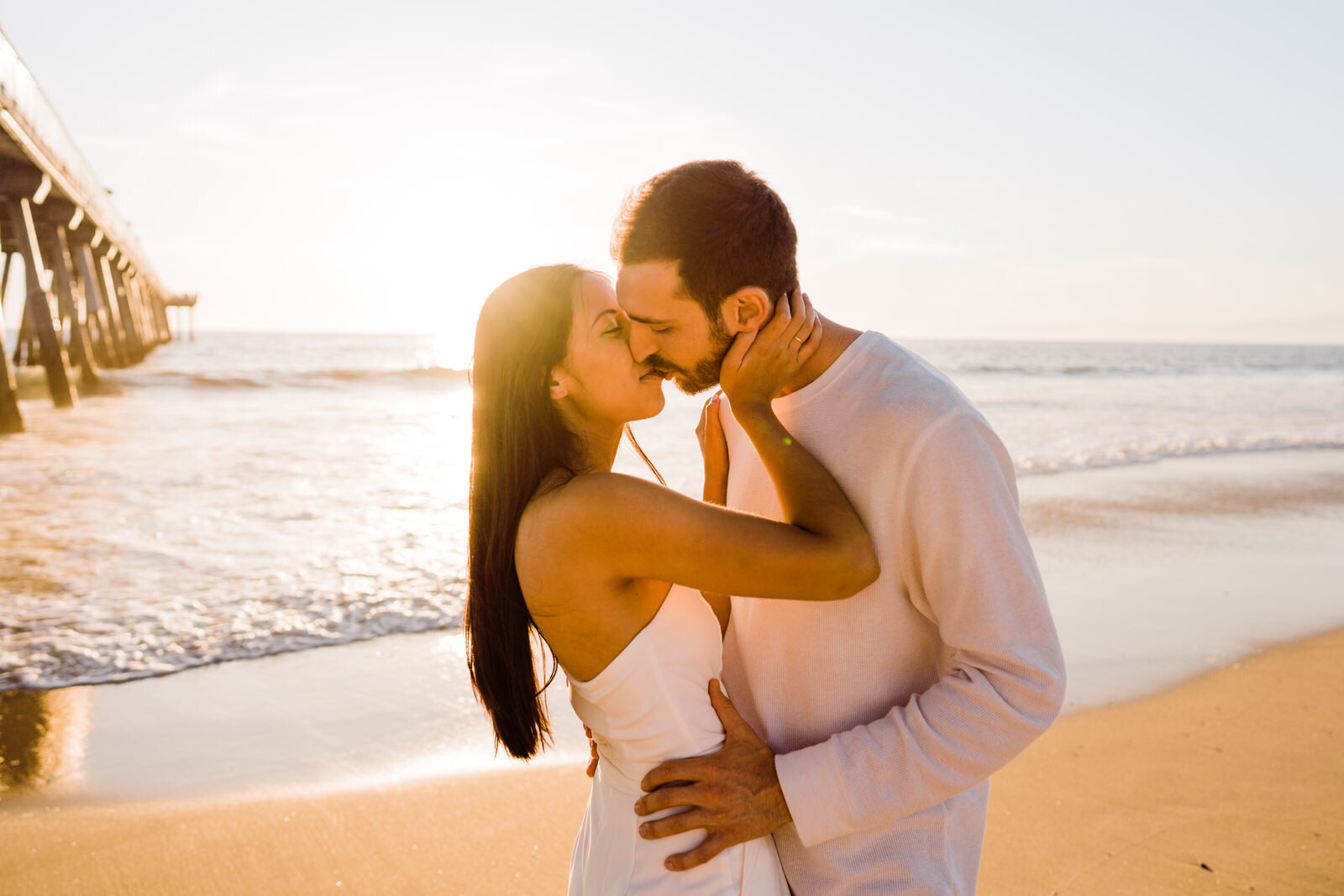 Couple kissing at Hermosa Beach