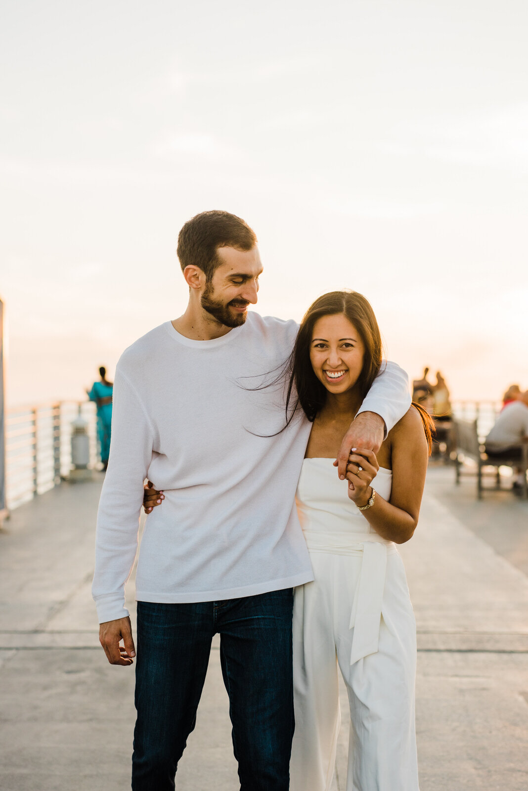 playful, fun engagement photos at Hermosa Beach Pier