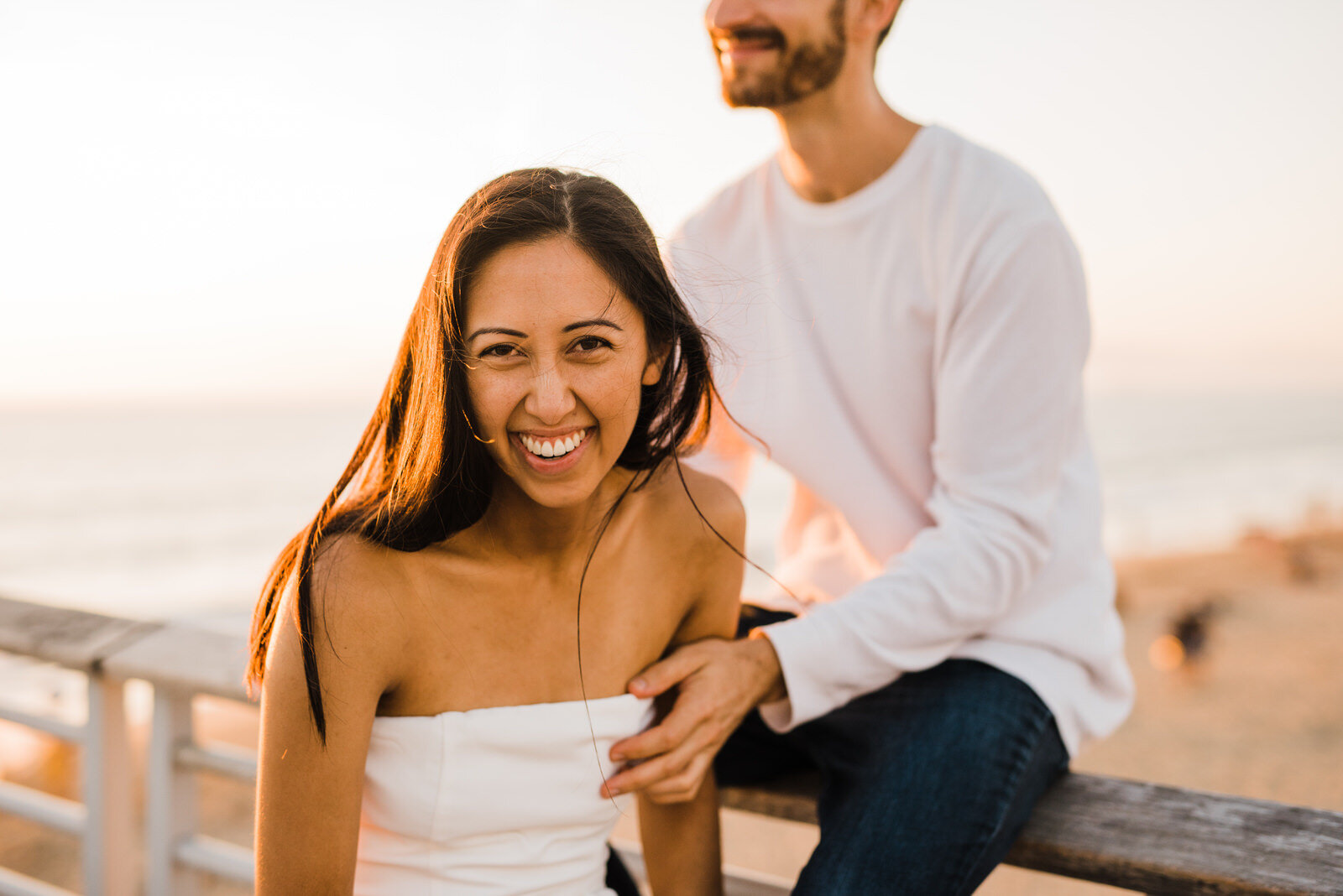 Hermosa beach engagement photos with couple wearing white at Sunset 