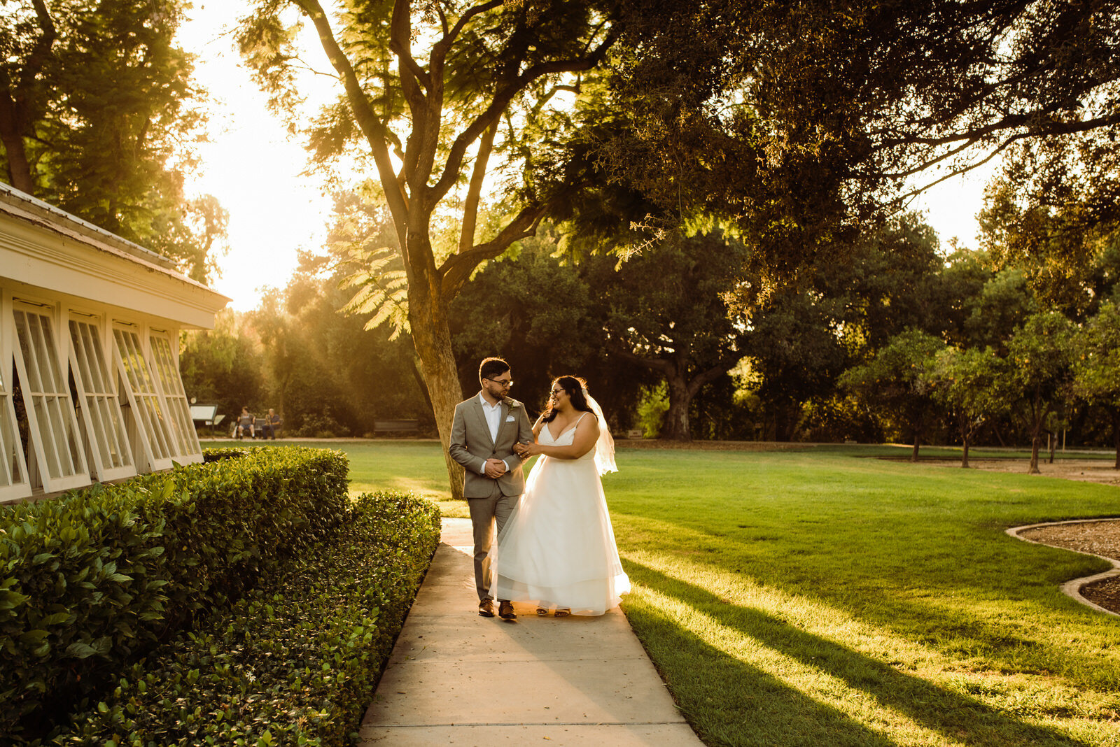 Wedding day photos of husband and wife at Heritage Park on a sunny Summery wedding day in Santa Fe Springs