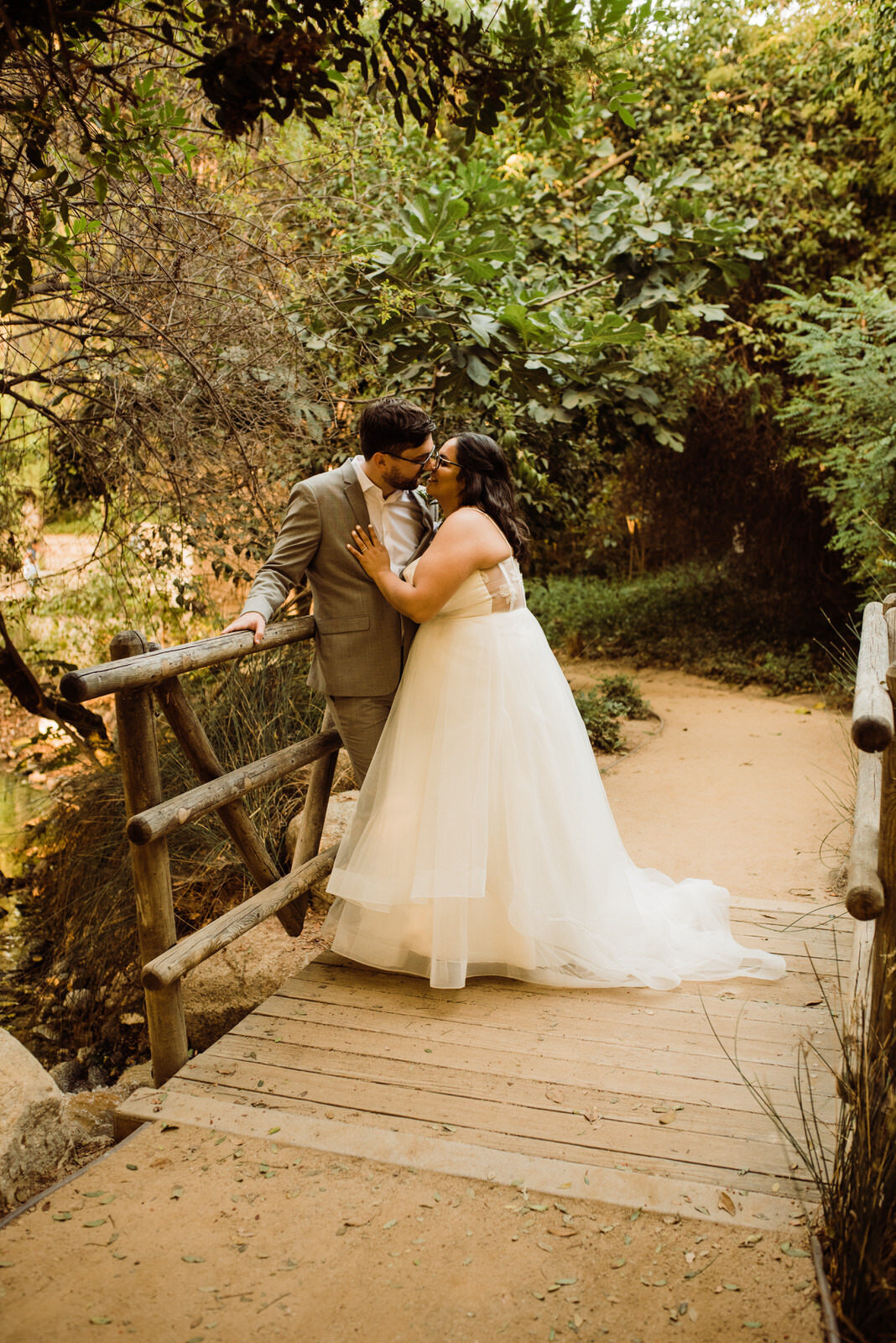 Bride and groom kiss at Heritage Park