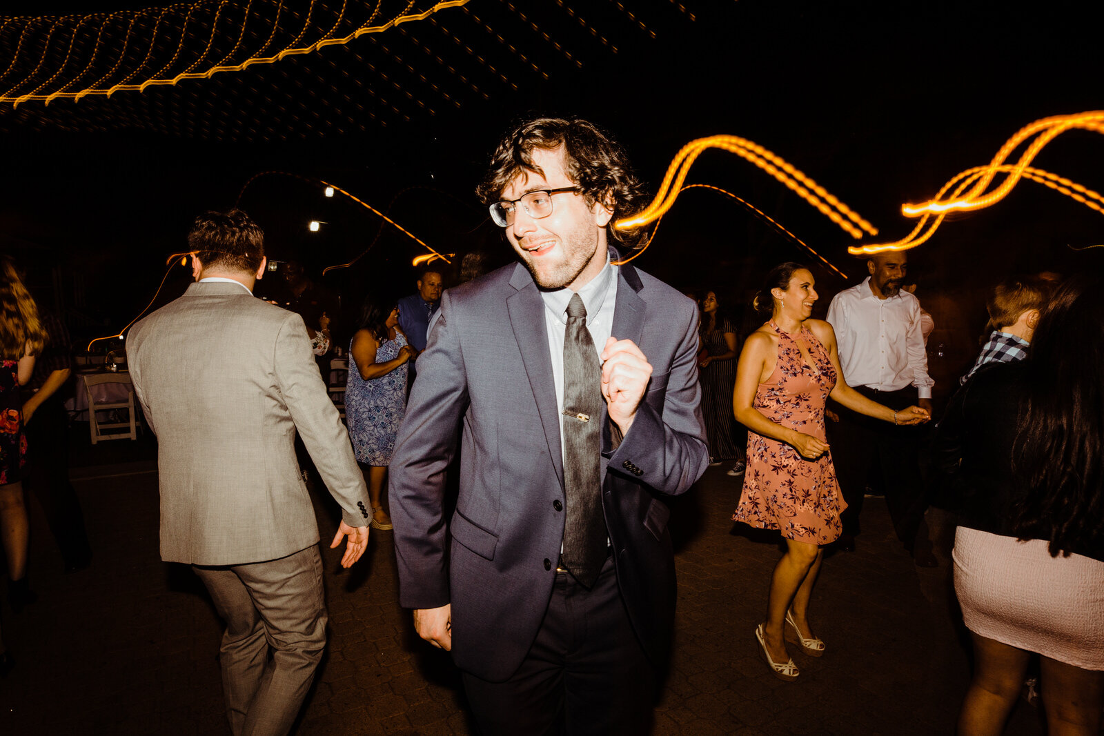 Fun, energetic dancing photos at Heritage Park wedding reception