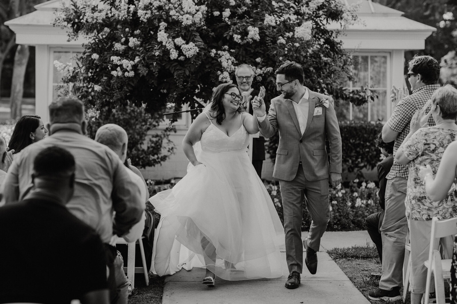 Couple exits ceremony at heritage park wedding