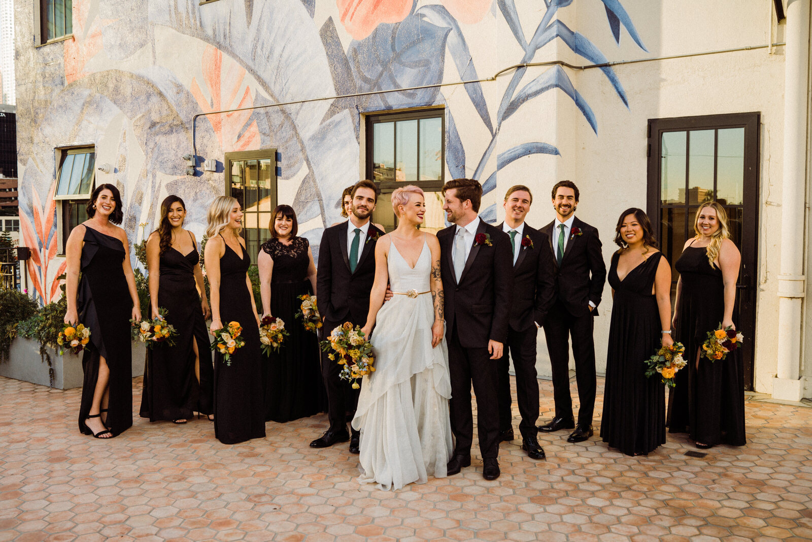 Playful, fun, candid photos of co-ed bridal party at Hotel Figuera in Los Angeles