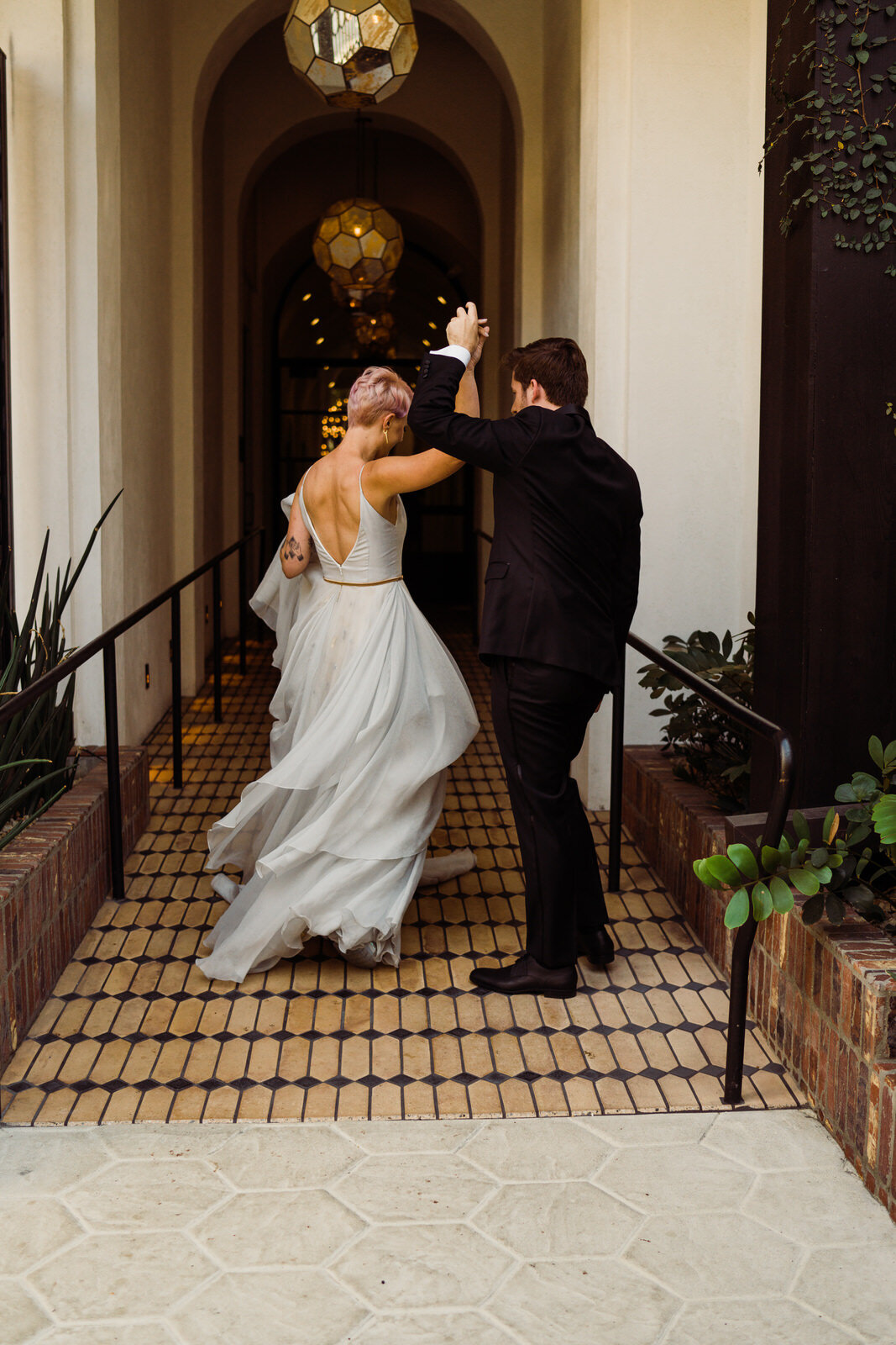 candid photos of newlyweds at Hotel Figueroa wedding