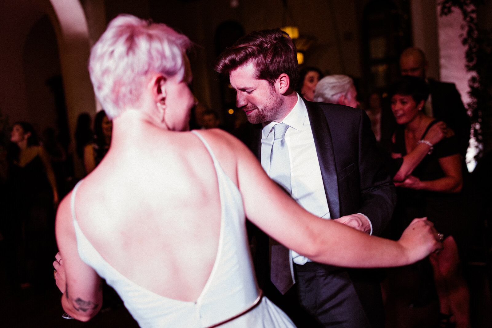 Newlyweds dance at modern, fun, unique wedding reception at Hotel Figueroa