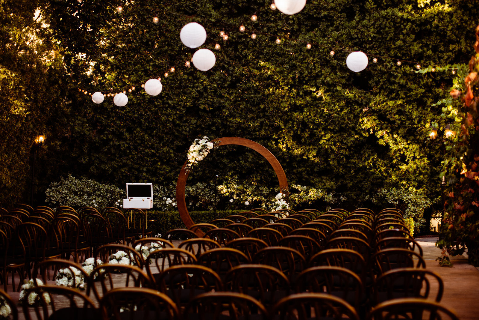 Ceremony space with lanterns at Franciscan Gardens in San Juan Capistrano
