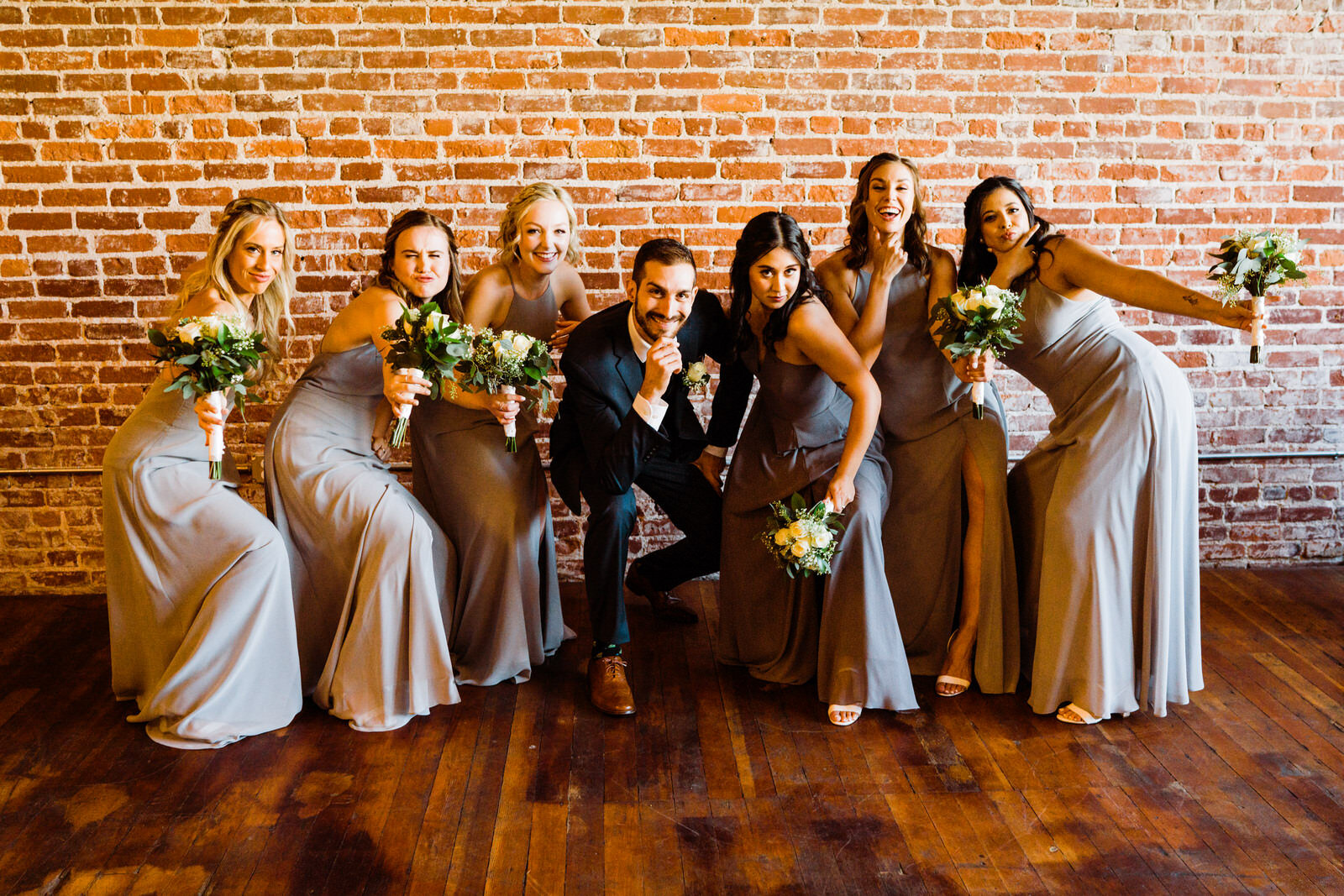 Groom and bridesmaids take funny photos | Candid, warm wedding photography | Franciscan Gardens wedding in San Juan Capistrano, CA by Kept Record www.keptrecord.com