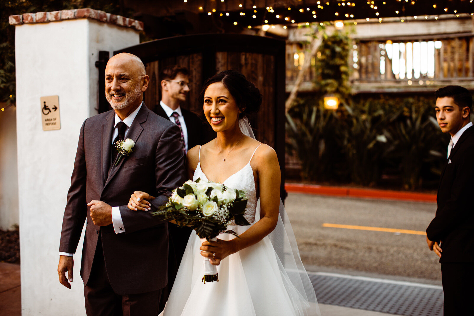 Bride and dad walk down aisle | Candid, warm wedding photography | Franciscan Gardens wedding in San Juan Capistrano, CA by Kept Record www.keptrecord.com