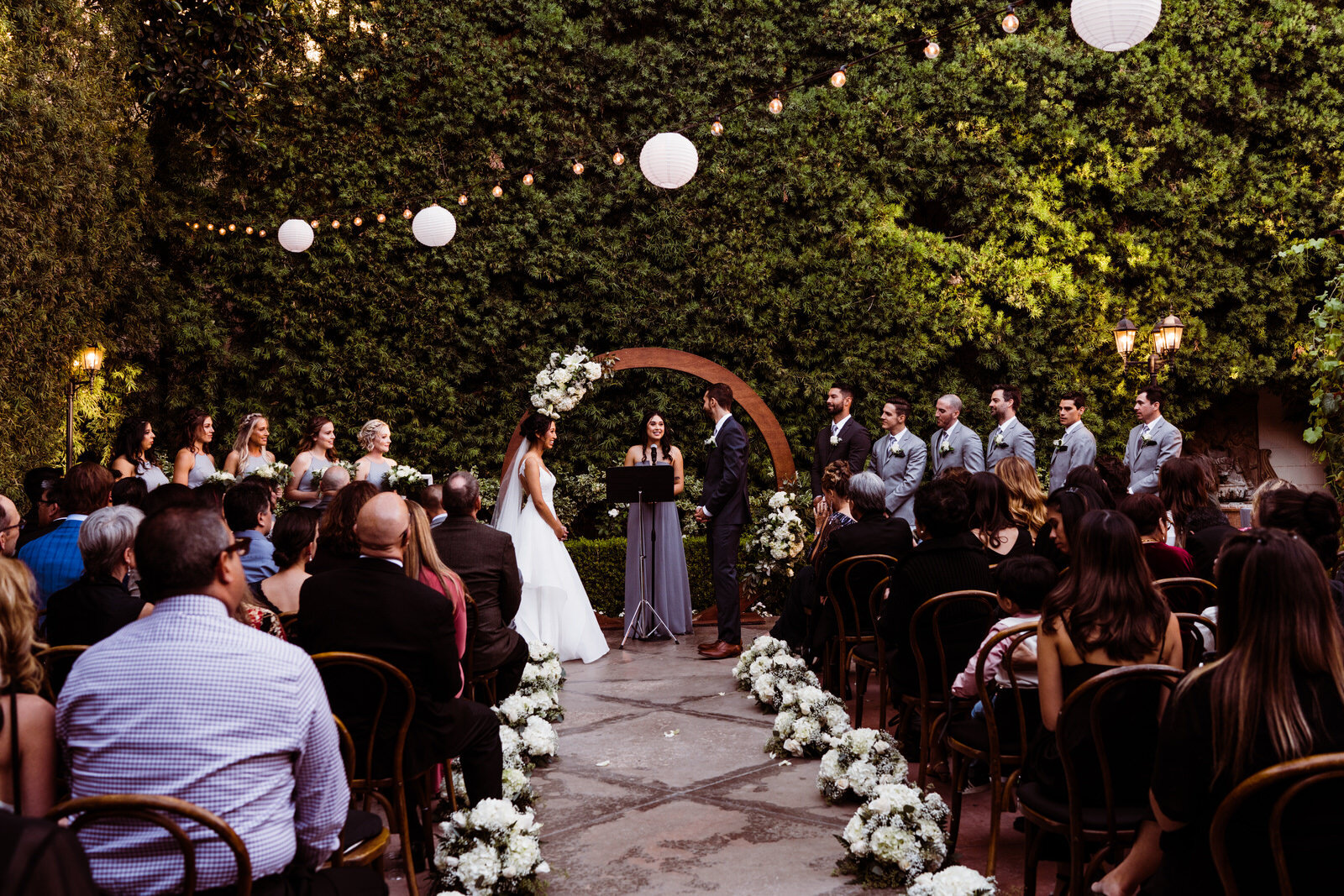 Circle wedding arch | Candid, warm wedding photography | Franciscan Gardens wedding in San Juan Capistrano, CA by Kept Record www.keptrecord.com