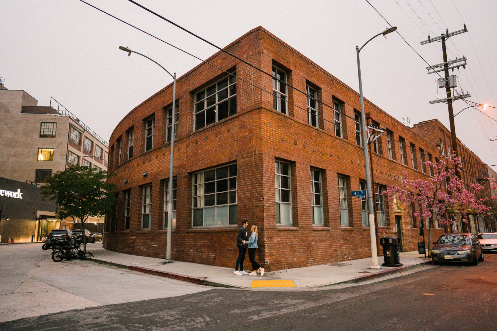 Dark and moody sunrise engagement photos in the LA Arts District | Fun, edgy, urban couples photos | Downtown LA Engagement photos | Photo by Kept Record | www.keptrecord.com