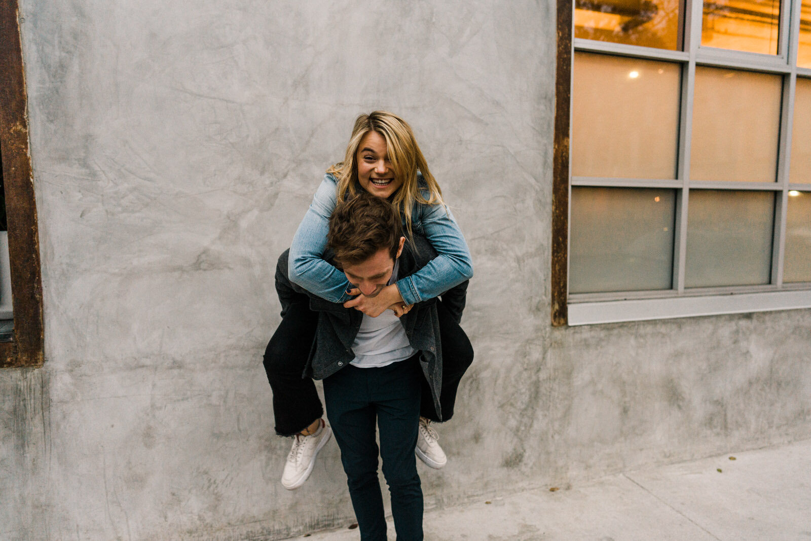 Dark and moody sunrise engagement photos in the LA Arts District | Fun, edgy, urban couples photos | Downtown LA Engagement photos | Photo by Kept Record | www.keptrecord.com