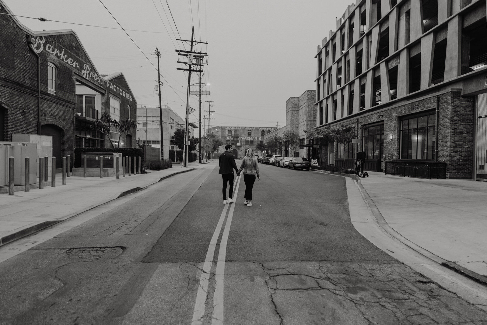 Dark and moody sunrise engagement photos in the LA Arts District | Fun, edgy, urban couples photos | Downtown LA Engagement photos | Photo by Kept Record | www.keptrecord.com