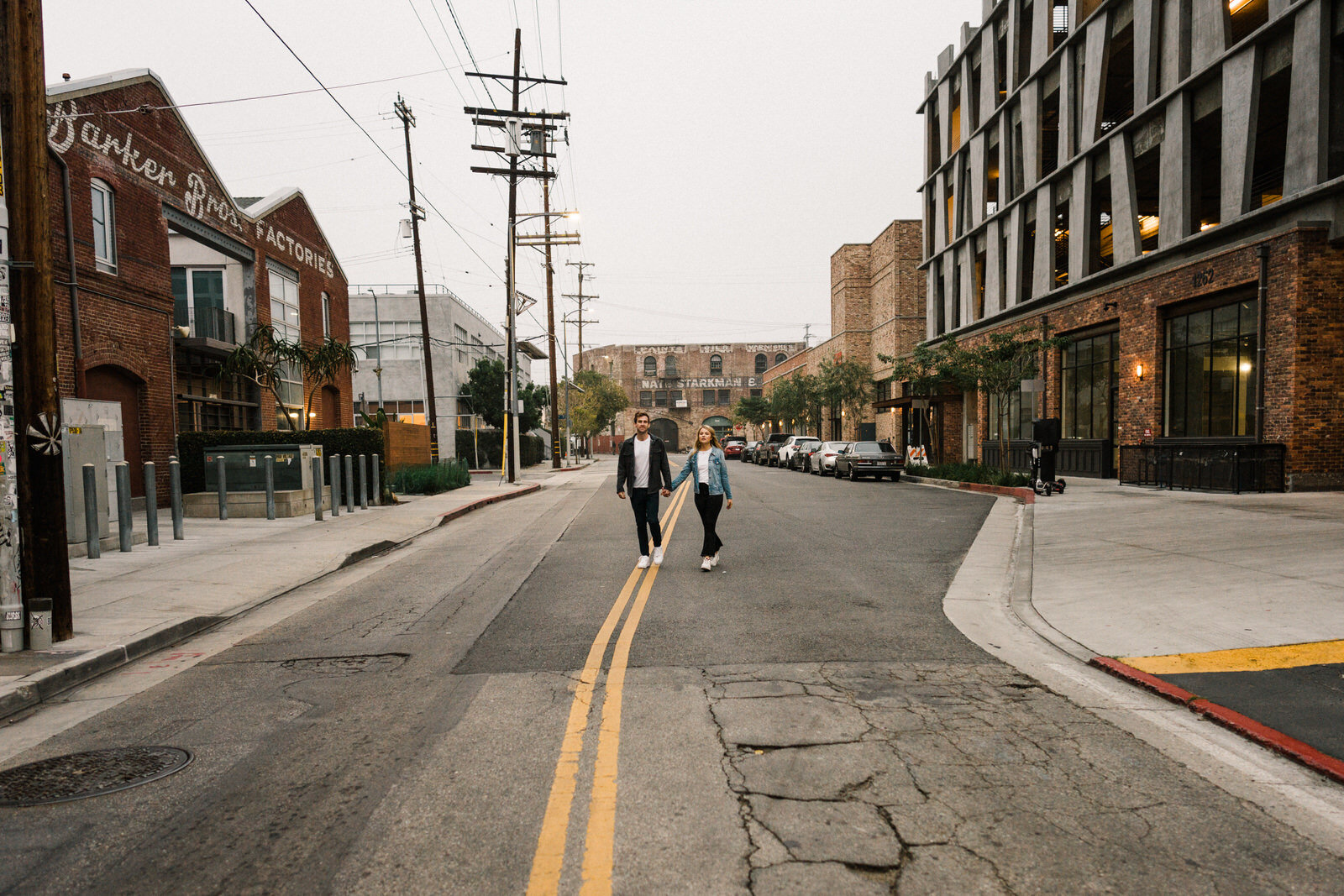 Dark and moody sunrise engagement photos in the LA Arts District | Fun, edgy, urban couples photos | Downtown LA Engagement photos | Photo by Kept Record | www.keptrecord.com