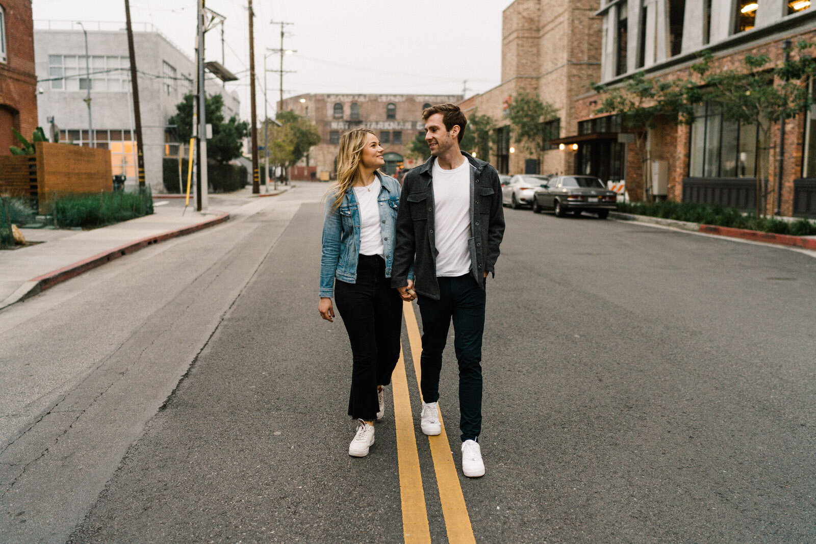 Dark and moody sunrise engagement photos in the LA Arts District | Fun, edgy, urban couples photos | Downtown LA Engagement photos | Photo by Kept Record | www.keptrecord.com