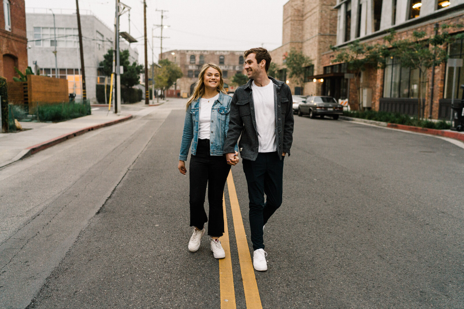 Dark and moody sunrise engagement photos in the LA Arts District | Fun, edgy, urban couples photos | Downtown LA Engagement photos | Photo by Kept Record | www.keptrecord.com