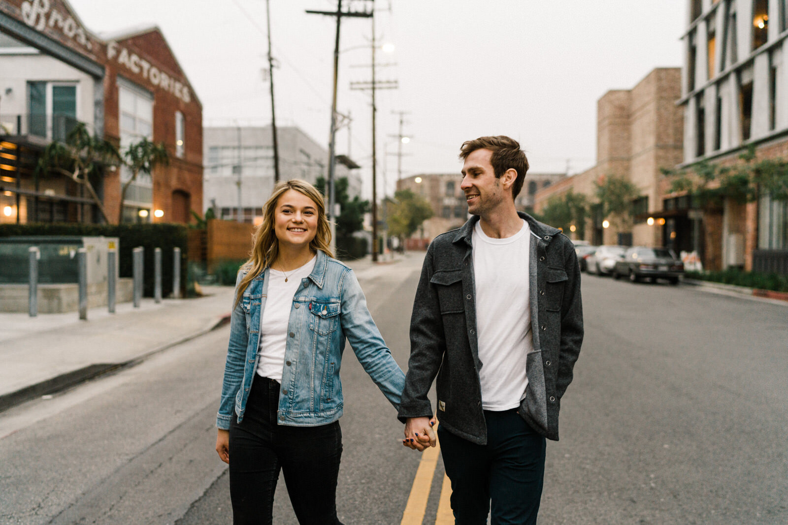 Dark and moody sunrise engagement photos in the LA Arts District | Fun, edgy, urban couples photos | Downtown LA Engagement photos | Photo by Kept Record | www.keptrecord.com