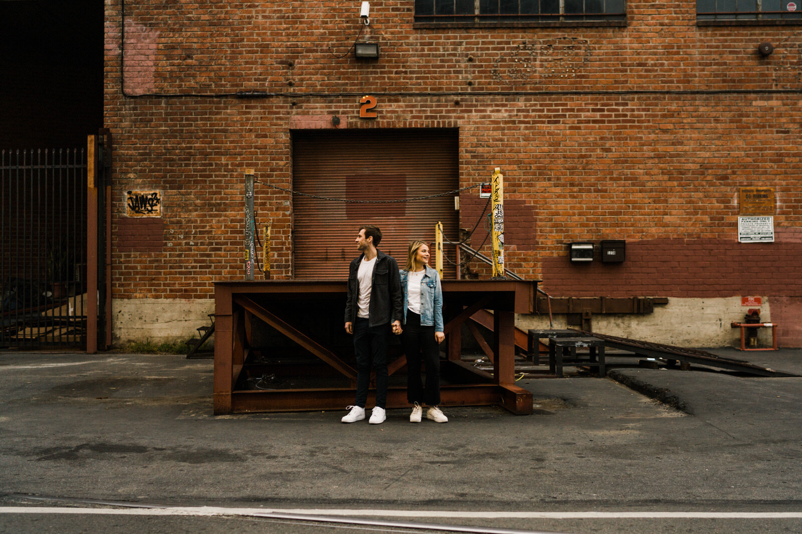 Dark and moody sunrise engagement photos in the LA Arts District | Fun, edgy, urban couples photos | Downtown LA Engagement photos | Photo by Kept Record | www.keptrecord.com