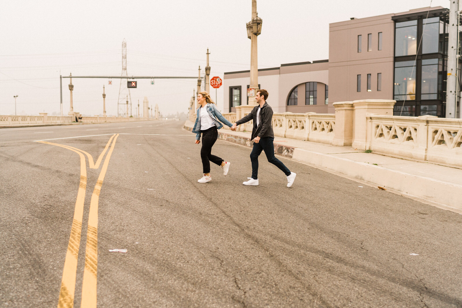 Dark and moody sunrise engagement photos in the LA Arts District | Fun, edgy, urban couples photos | Downtown LA Engagement photos | Photo by Kept Record | www.keptrecord.com