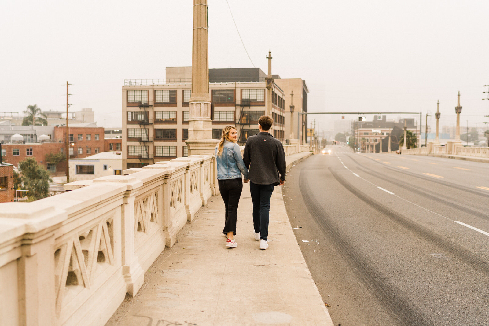 Dark and moody sunrise engagement photos in the LA Arts District | Fun, edgy, urban couples photos | Downtown LA Engagement photos | Photo by Kept Record | www.keptrecord.com