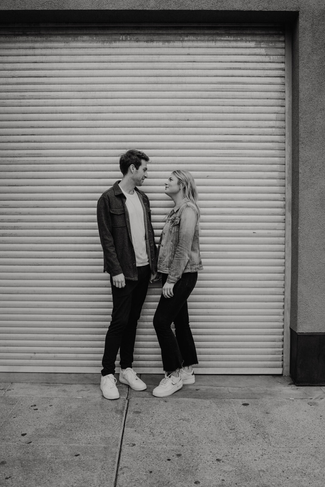 Dark and moody sunrise engagement photos in the LA Arts District | Fun, edgy, urban couples photos | Downtown LA Engagement photos | Photo by Kept Record | www.keptrecord.com