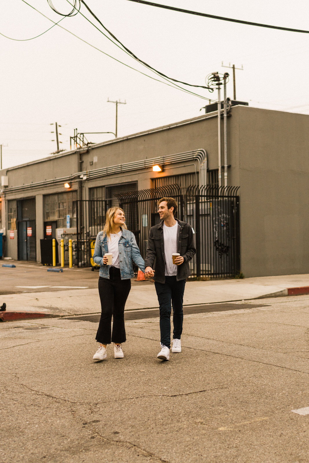 Engagement photos in the LA Arts District with Blue Bottle Coffee | Fun, edgy, urban couples photos | Downtown LA Engagement photos | Photo by Kept Record | www.keptrecord.com