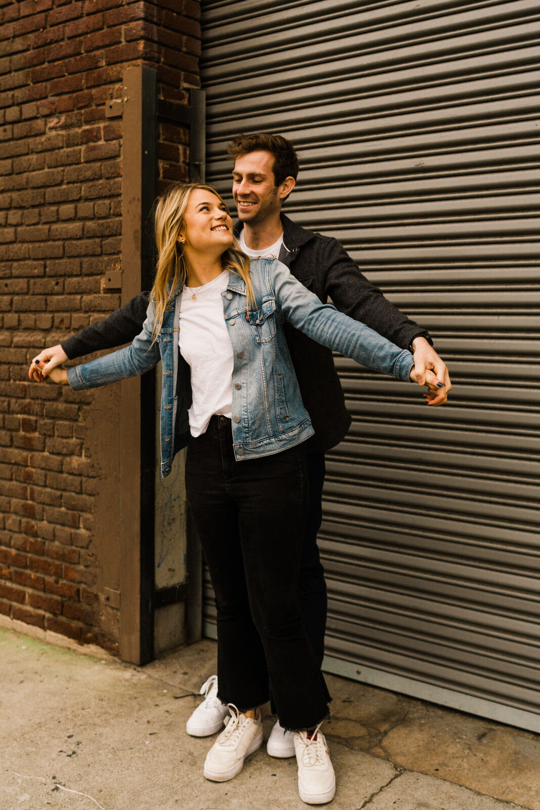 Engagement photos in the LA Arts District with Blue Bottle Coffee | Fun, edgy, urban couples photos | Downtown LA Engagement photos | Photo by Kept Record | www.keptrecord.com