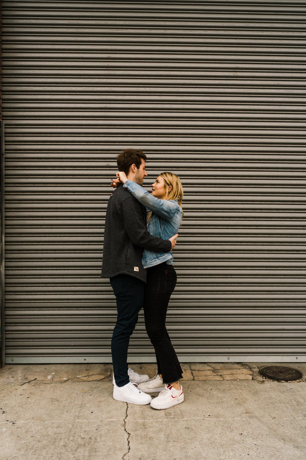 Engagement photos in the LA Arts District with Blue Bottle Coffee | Fun, edgy, urban couples photos | Downtown LA Engagement photos | Photo by Kept Record | www.keptrecord.com