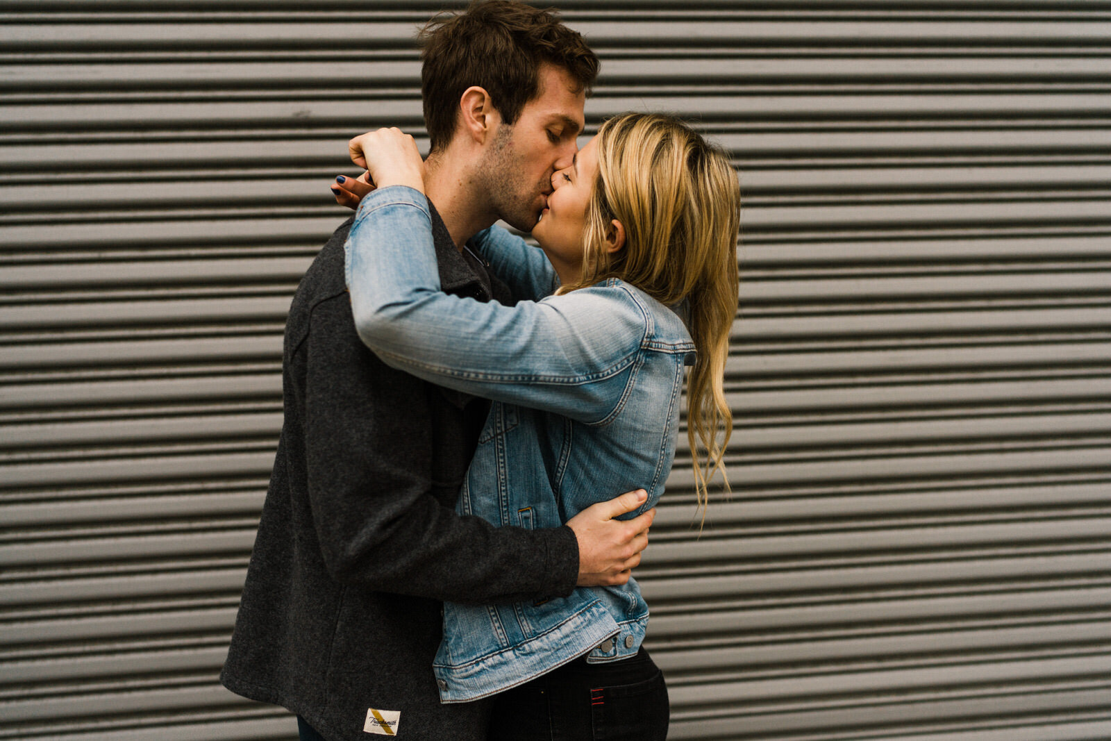 Engagement photos in the LA Arts District with Blue Bottle Coffee | Fun, edgy, urban couples photos | Downtown LA Engagement photos | Photo by Kept Record | www.keptrecord.com