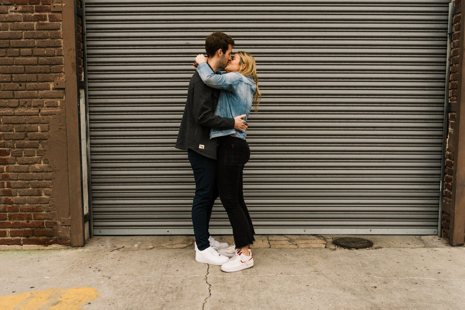 Engagement photos in the LA Arts District with Blue Bottle Coffee | Fun, edgy, urban couples photos | Downtown LA Engagement photos | Photo by Kept Record | www.keptrecord.com