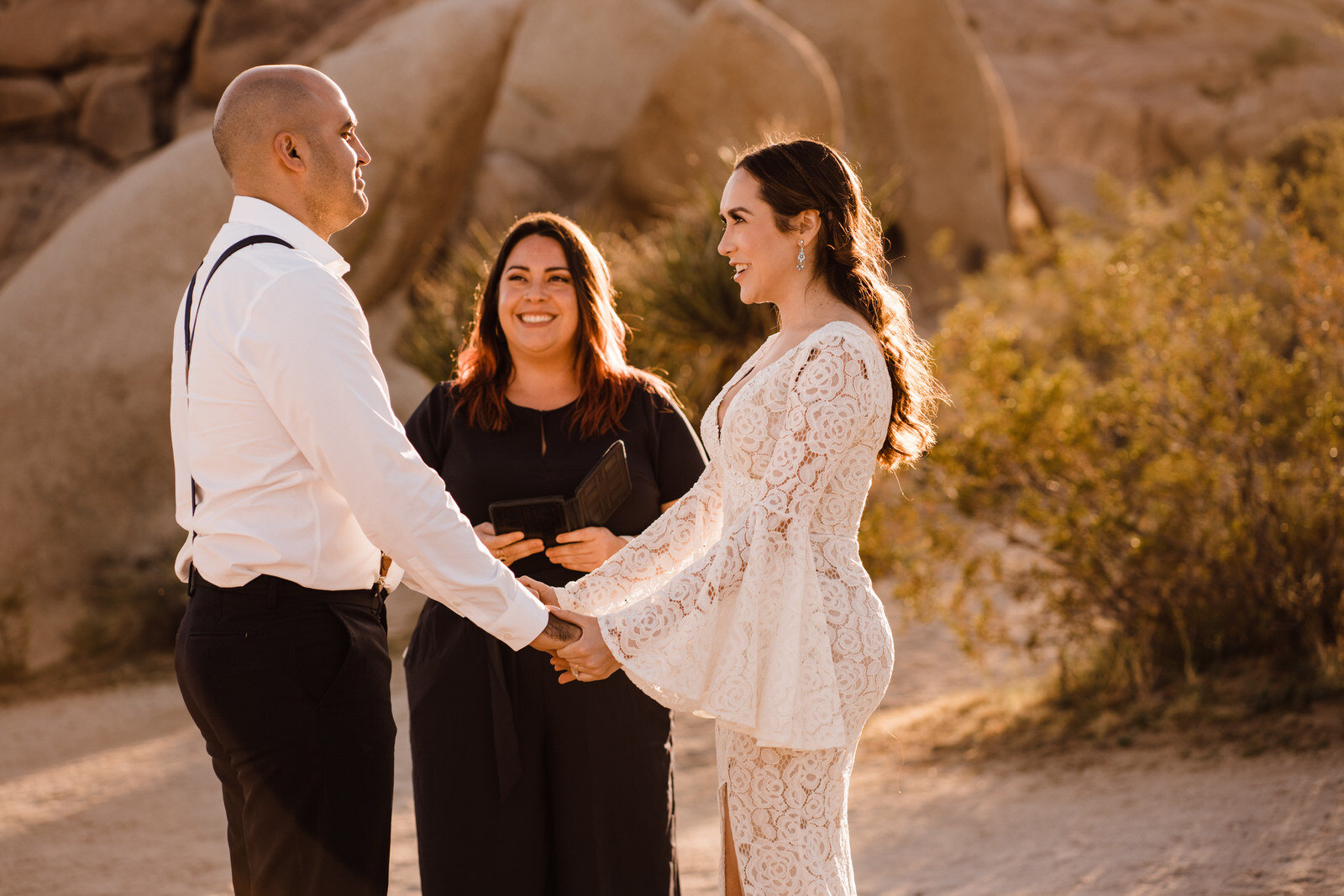 Bride and groom with Marie Burns Holzer of Lets Get Married by Marie at Joshua Tree Elopement Ceremony | adventurous, fun, warm wedding photos by Kept Record | www.keptrecord.com