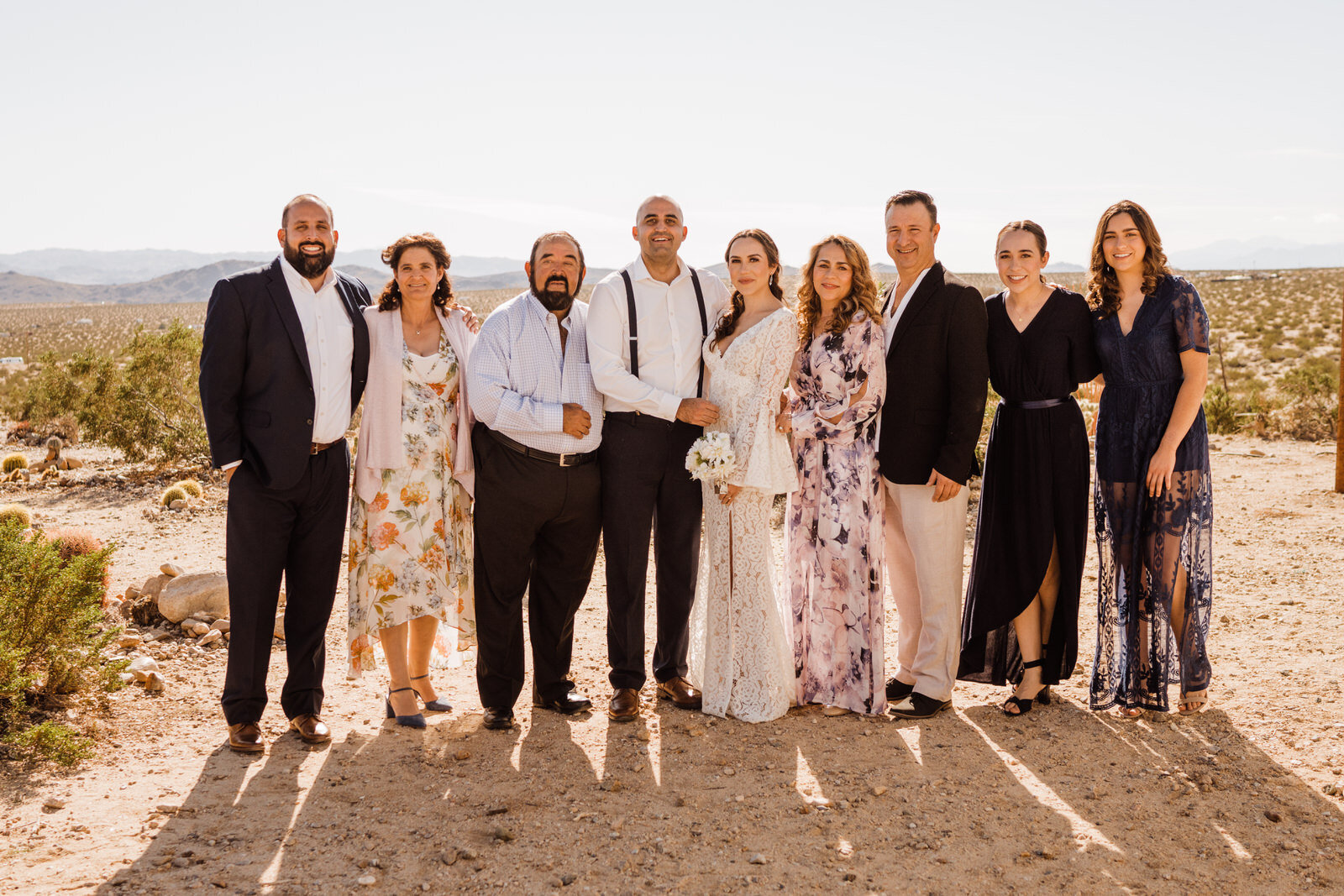 Proving that you can elope with family - family photo at Cactus Mountain Retreat in Joshua Tree before elopement | adventurous, fun, warm wedding photos by Kept Record | www.keptrecord.com