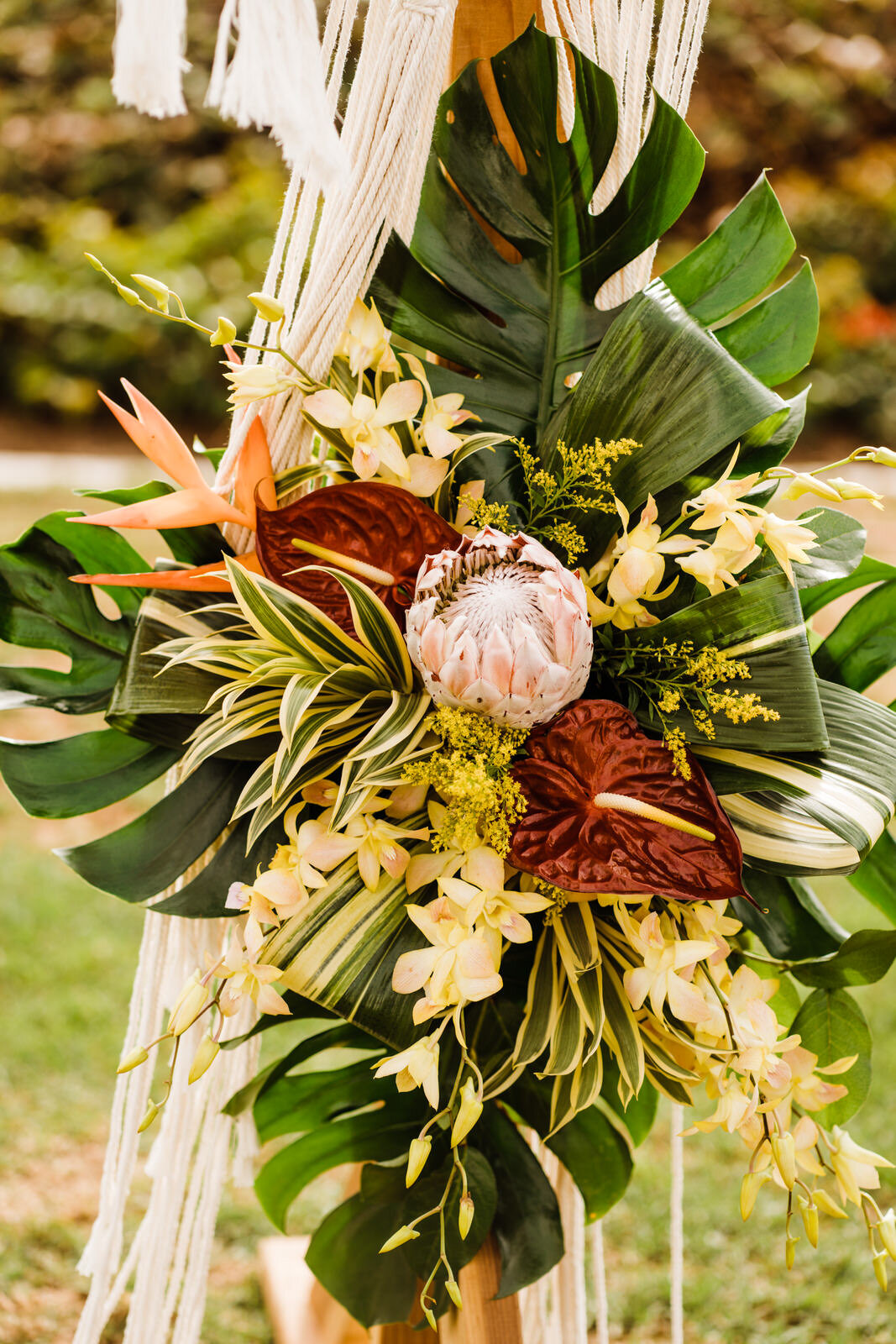 ole-hanson-beach-club-wedding-tropical-flowers-on-altar.jpg