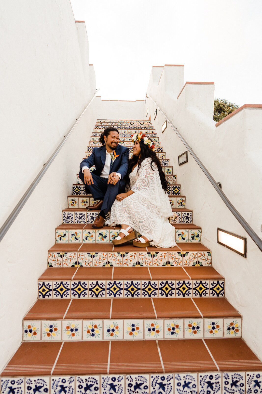 ole-hanson-beach-club-wedding-bride-and-groom-on-stairs.jpg
