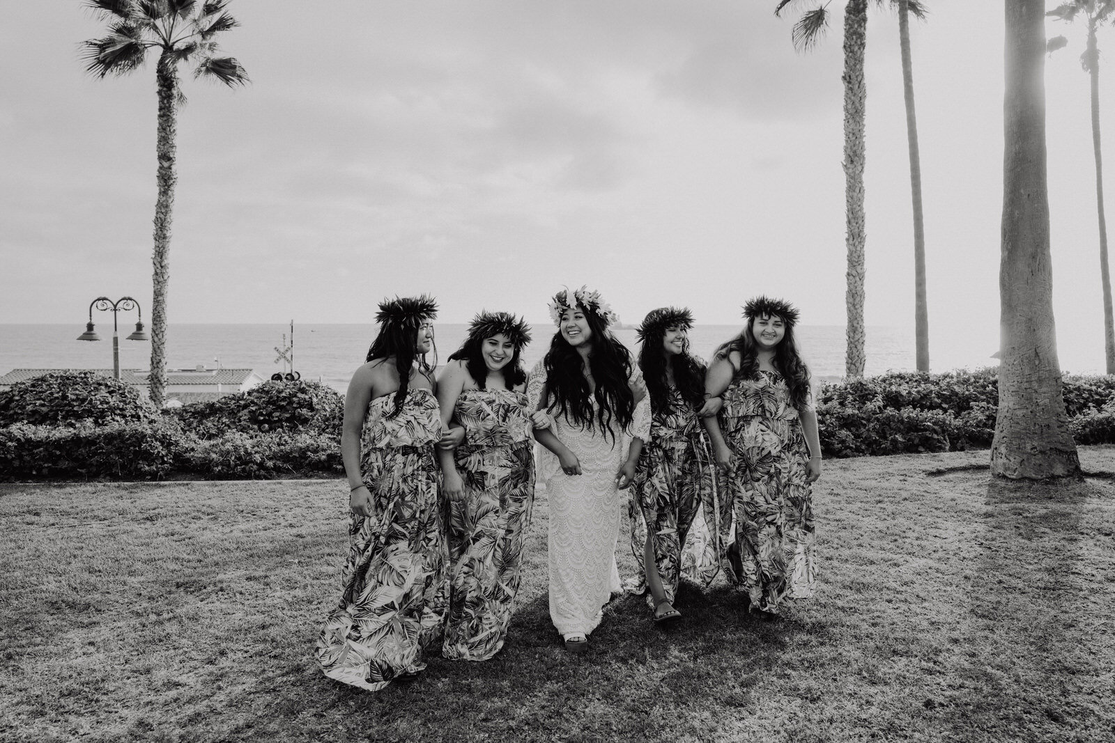 Bridal party with tropical dresses and flower crowns