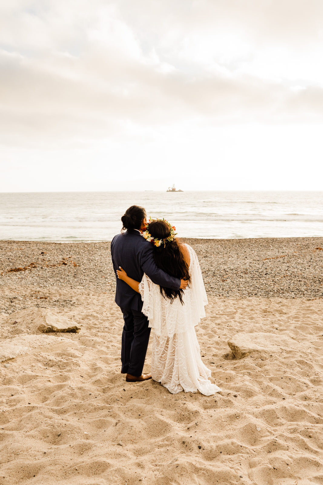 Bride and groom on San Clemente beach