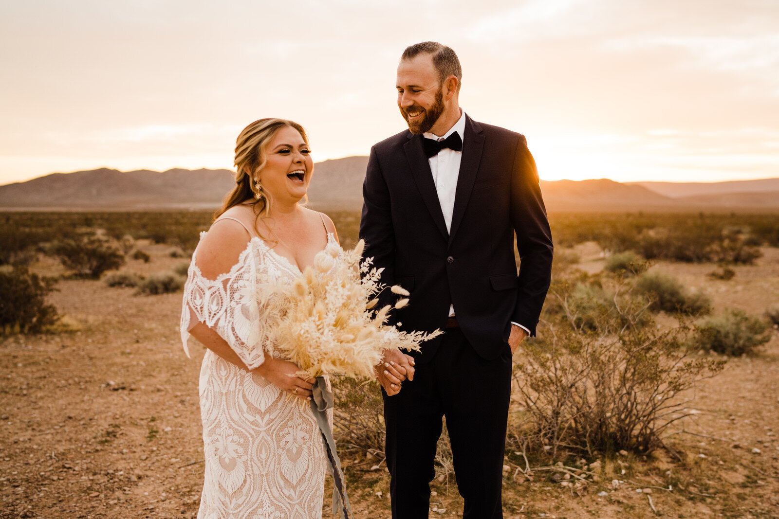 Las-Vegas-Wedding-Seven-Magic-Mountains-First-Look-Candid-Photo-of-Bride-Groom-Laughing.JPG