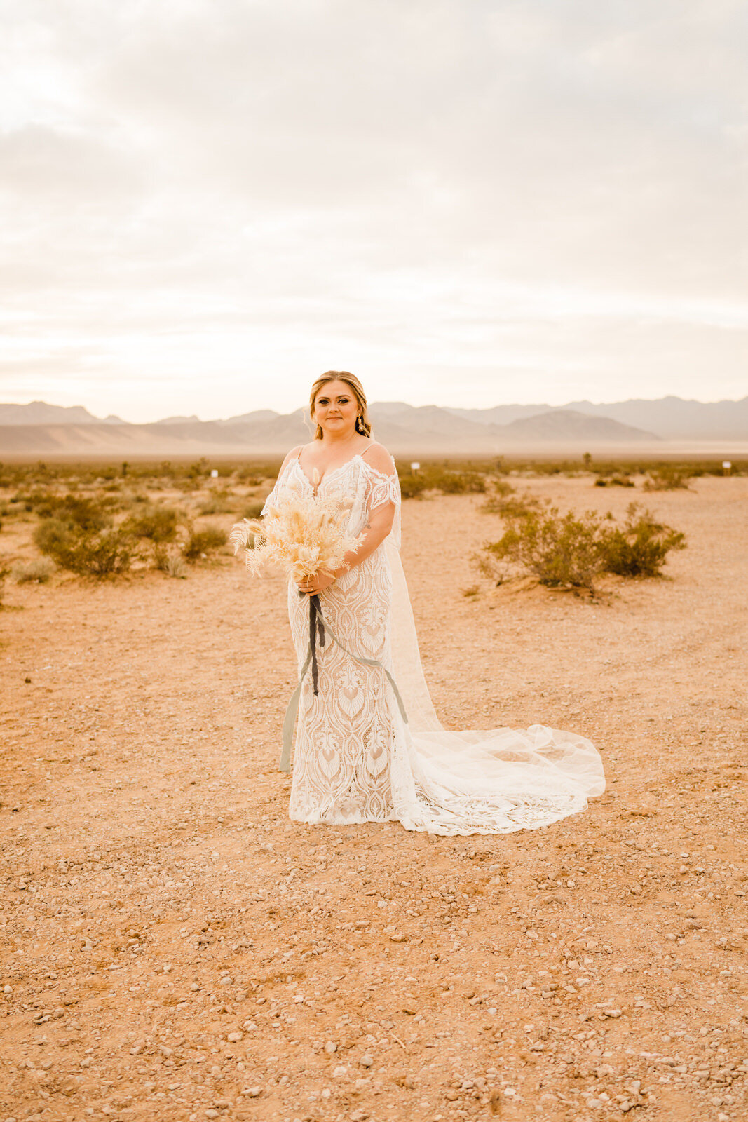 Las-Vegas-Wedding-Seven-Magic-Mountains-First-Look-bride-at-sunrise-with-pampas-bouquet.JPG