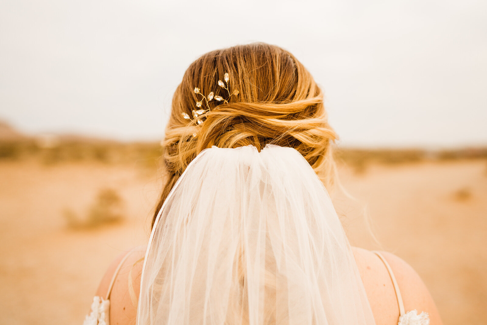 Las-Vegas-Wedding-Seven-Magic-Mountains-First-Look-Bride-in-Desert-at-sunrise-veil-headpiece.JPG