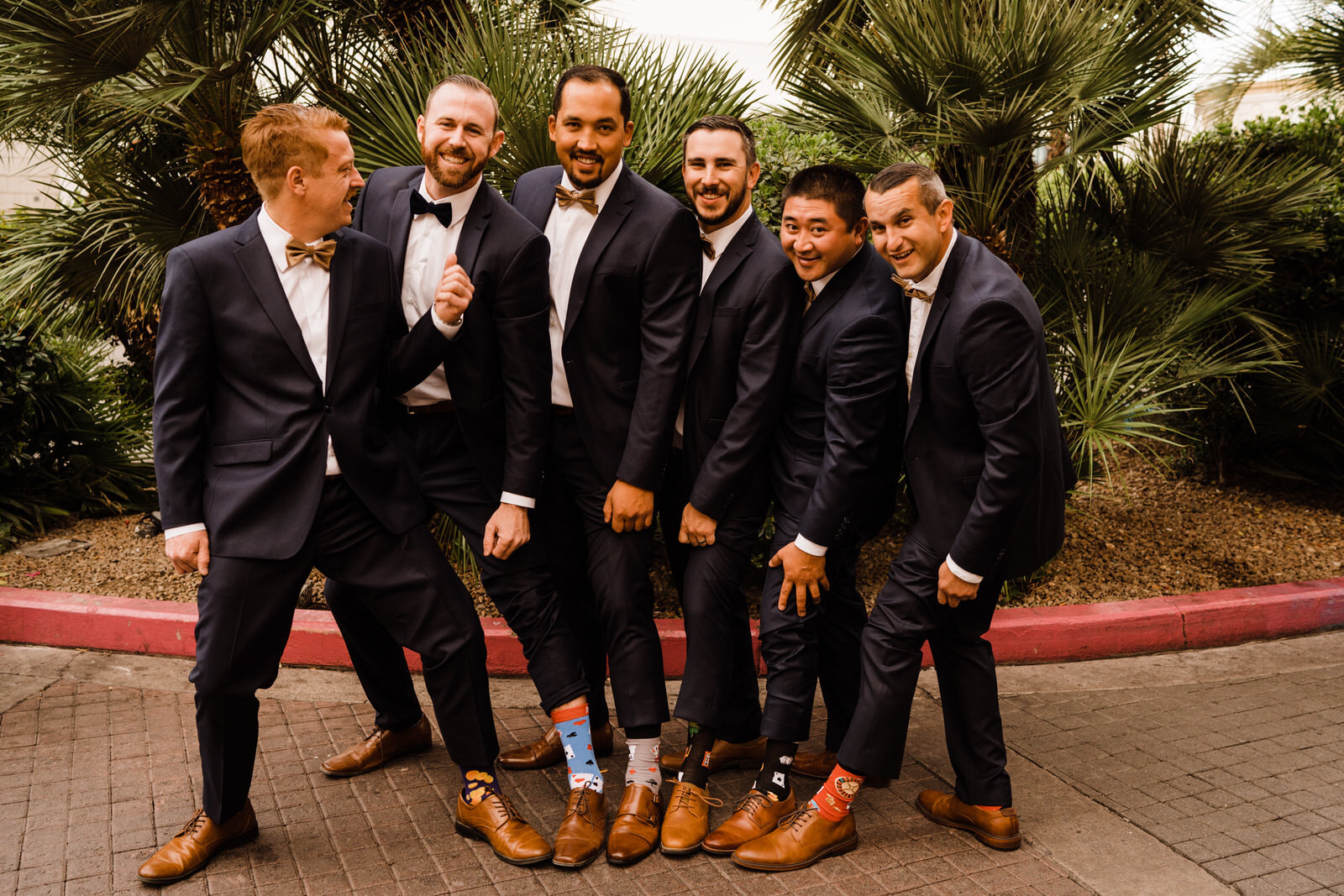 Silly photo of groom and groomsmen at Las Vegas destination wedding