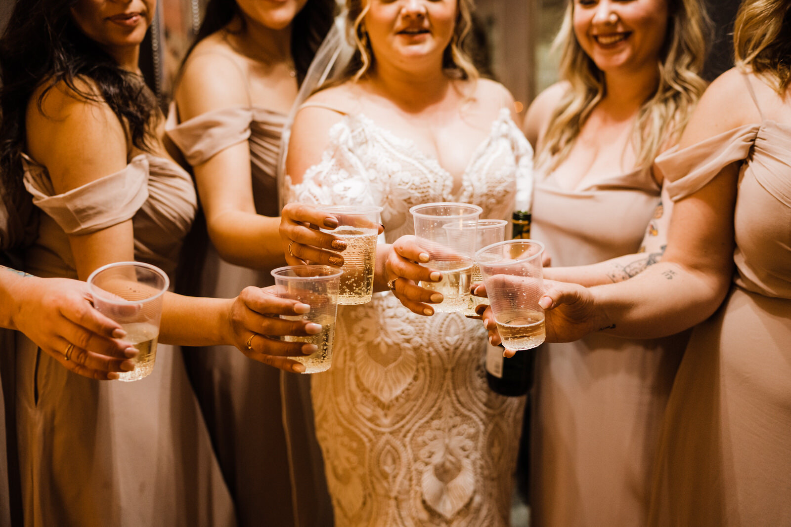 Bride and bridesmaid drinking champagne at Little Church of the West Las Vegas wedding chapel