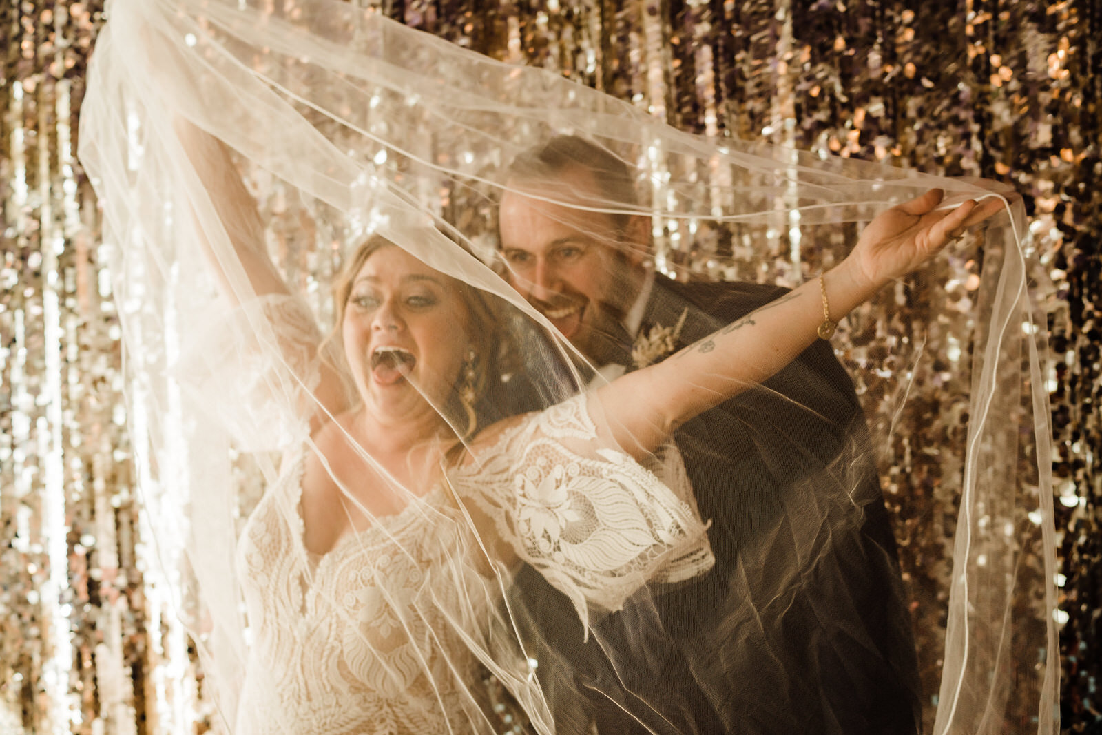 Goofy photo of Bride and Groom with Veil at Las Vegas Margaritaville wedding reception