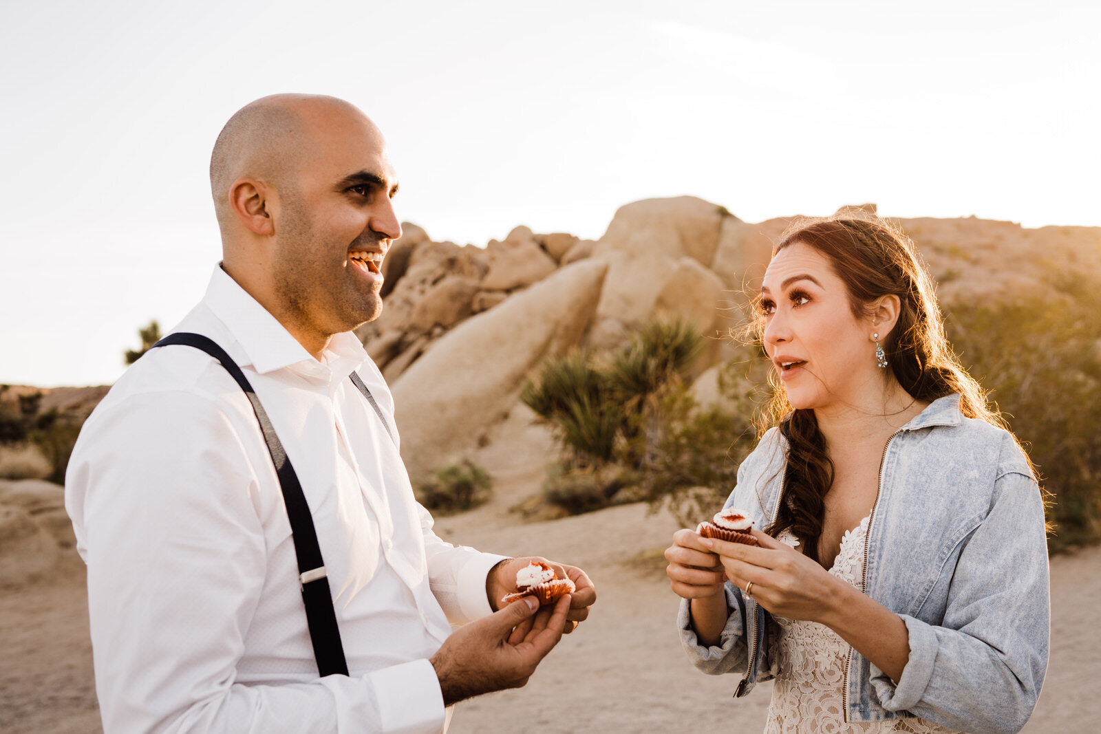 bride-and-groom-eat-cupcakes-after-eloping-in-joshua-tree-national-park.jpg