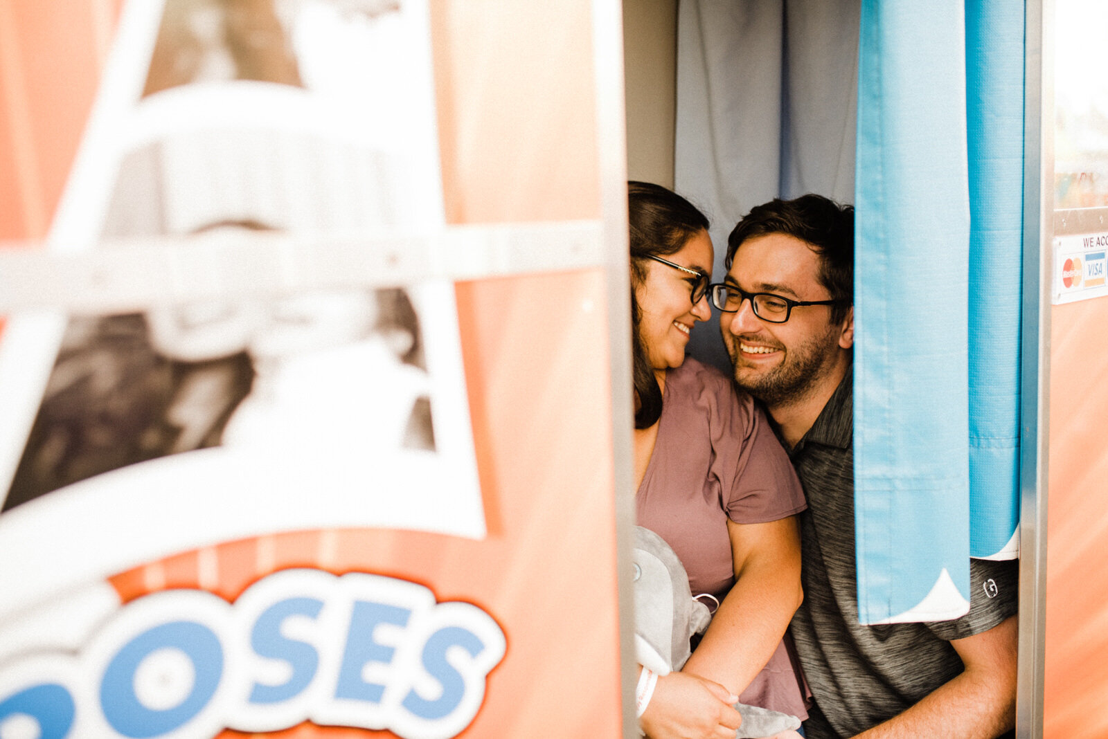 Couple inside photobooth | unconventional engagement locations | fun, nontraditional wedding photos by California Elopement Photographer Planner Kept Record | www.keptrecord.com