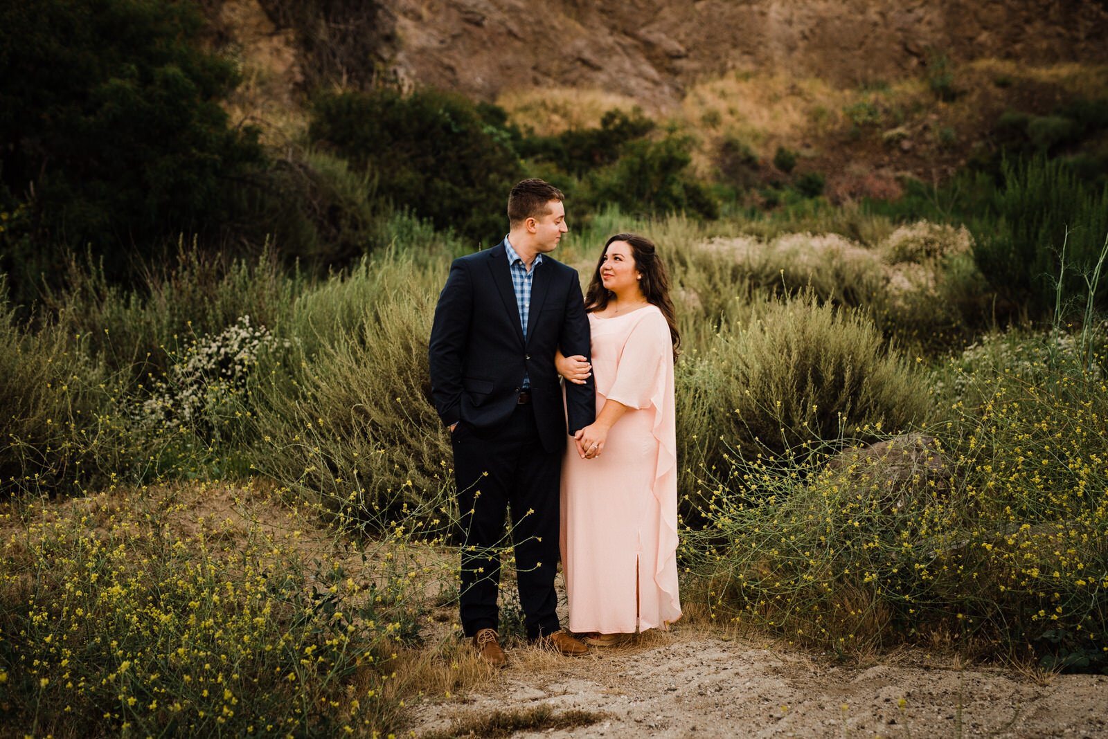 Summer adventurous engagement photos in Hollywood Hills | bride wearing pink dress | fun, nontraditional wedding photos by California Elopement Photographer Planner Kept Record | www.keptrecord.com