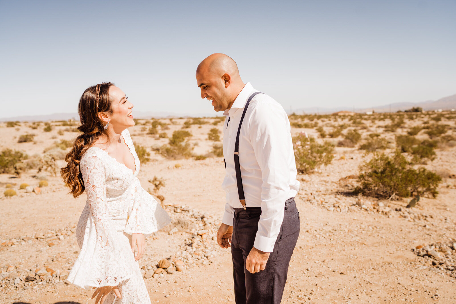 Joshua Tree eloping couple shares first look outside Joshua Tree National Park | fun, nontraditional wedding photos by California Elopement Photographer Planner Kept Record | www.keptrecord.com