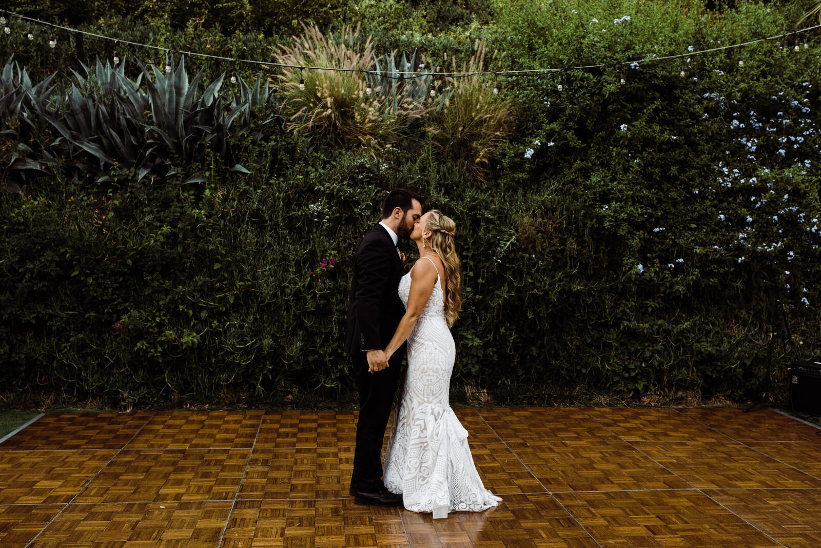 Bride and groom kiss on dancefloor at Houdini Estate summer wedding | fun, nontraditional wedding photos by California Elopement Photographer Planner Kept Record | www.keptrecord.com