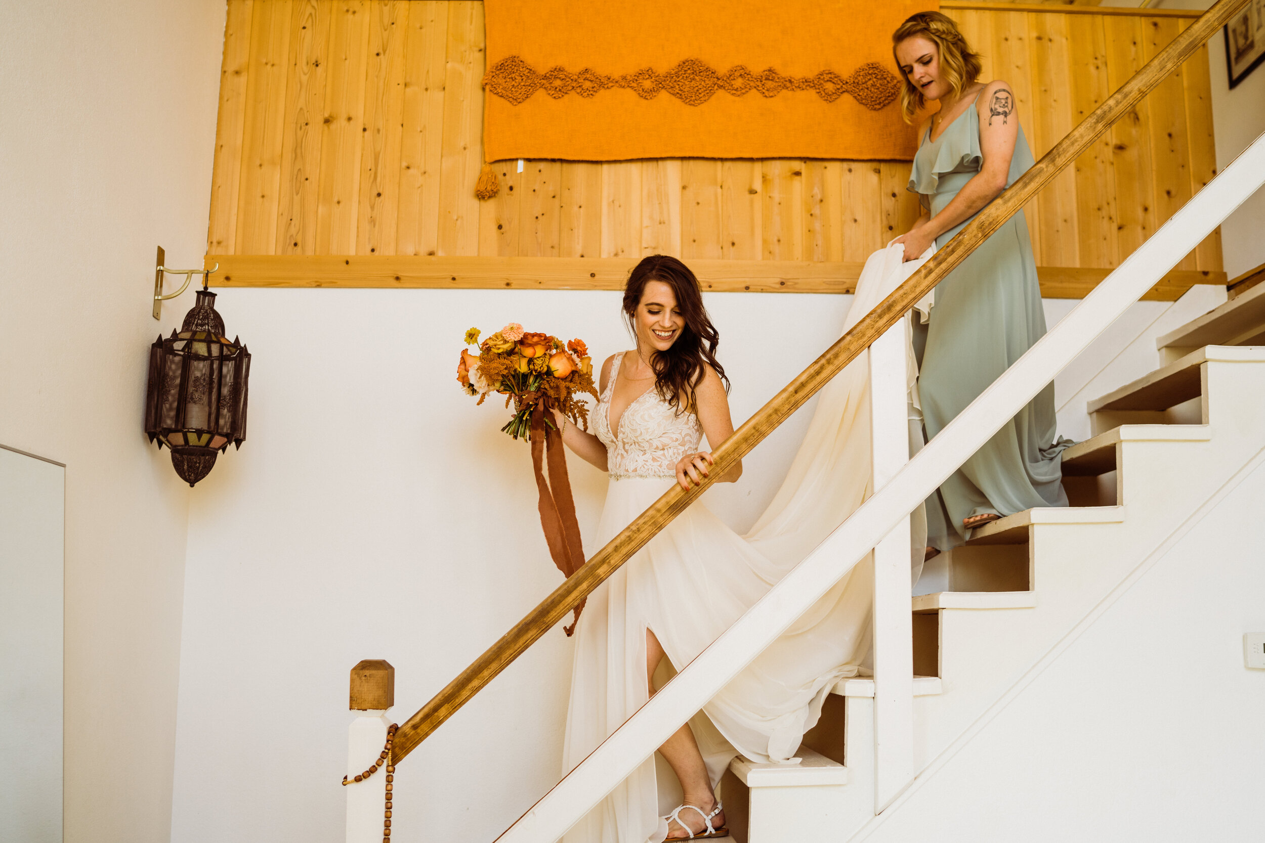 Bride descends stairs at Joshua Tree airbnb elopement wedding | fun, nontraditional wedding photos by California Elopement Photographer Planner Kept Record | www.keptrecord.com