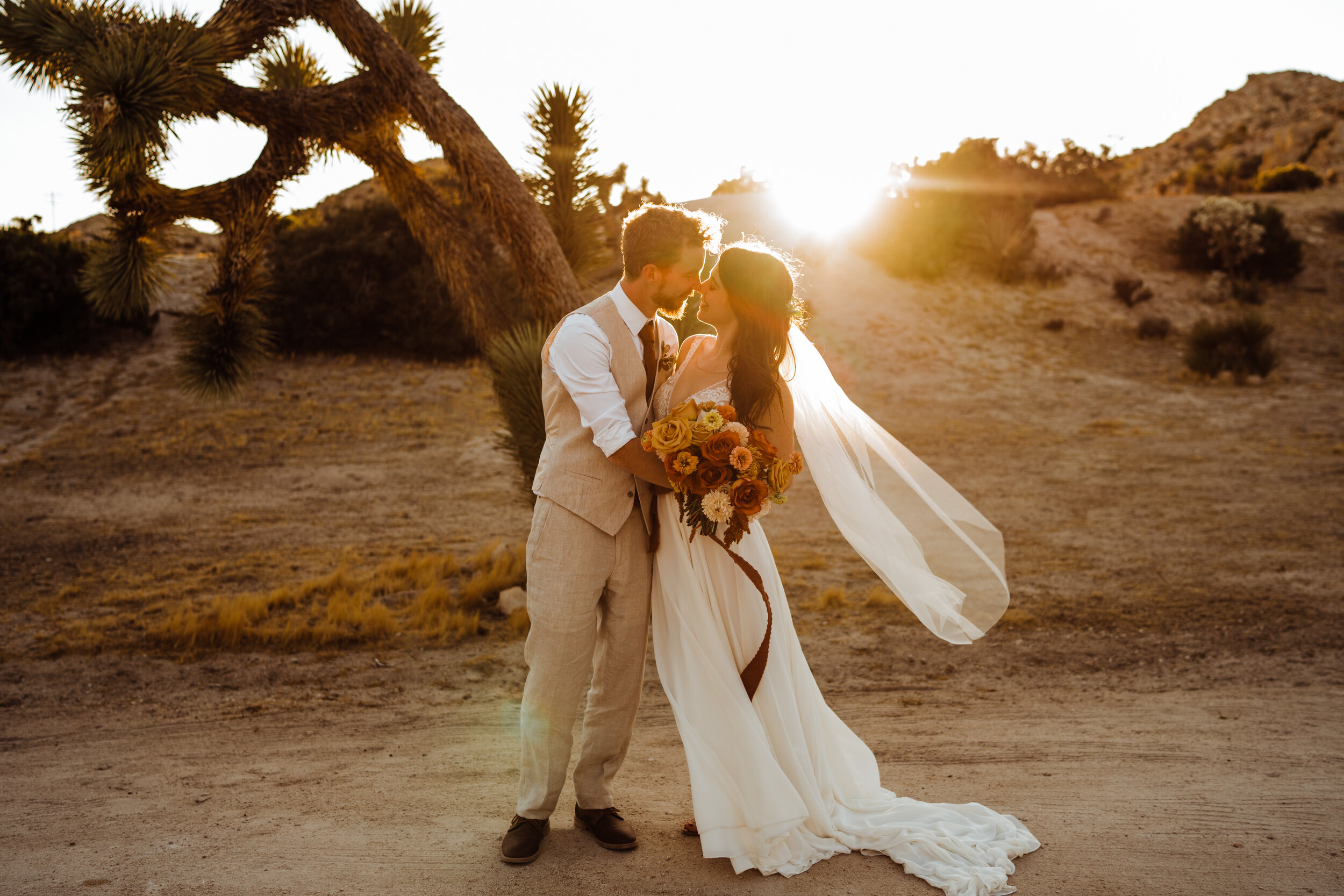 Joshua Tree elopement bride and groom at sunset | fun, nontraditional wedding photos by California Elopement Photographer Planner Kept Record | www.keptrecord.com